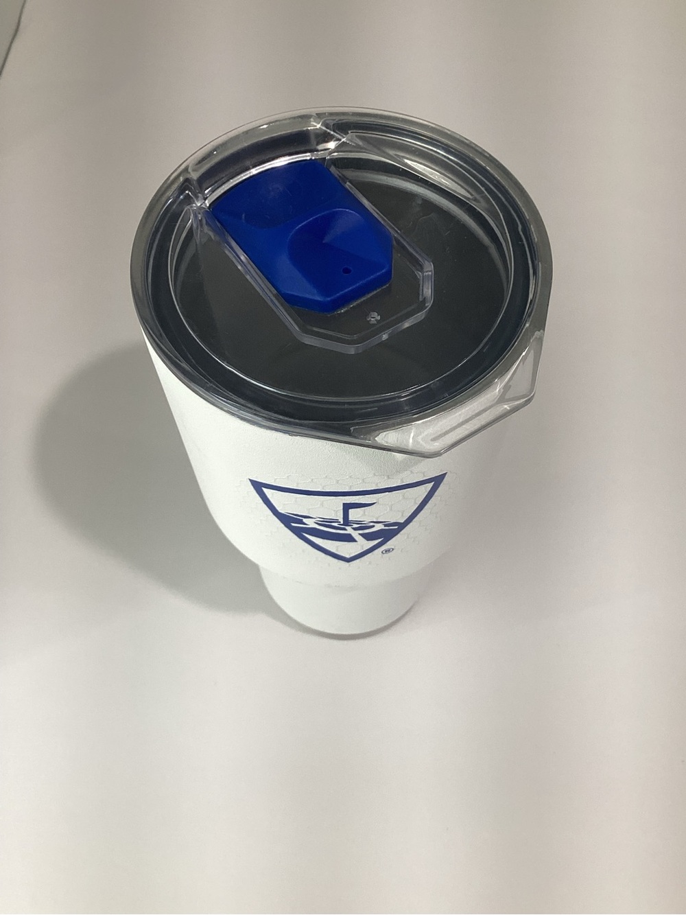 White Insulated Travel Tumbler with Blue Flip Lid and Logo